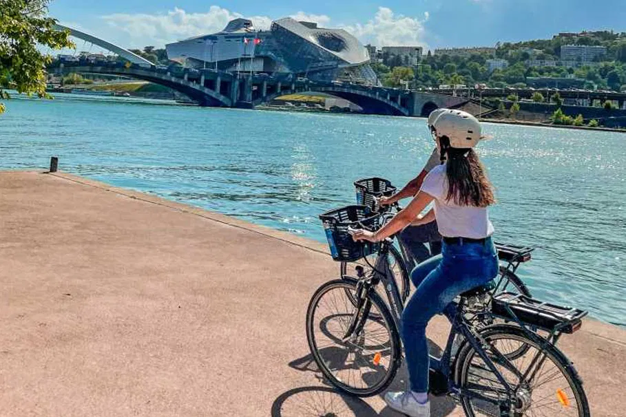 2-hour riverside ebike tour of Lyon's Confluence district | Tours & Travel Packages | Alikeimage