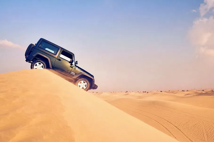 Experience the Thrill of Dune Bashing by Toyota Fortuner | Book Now | Alikeimage