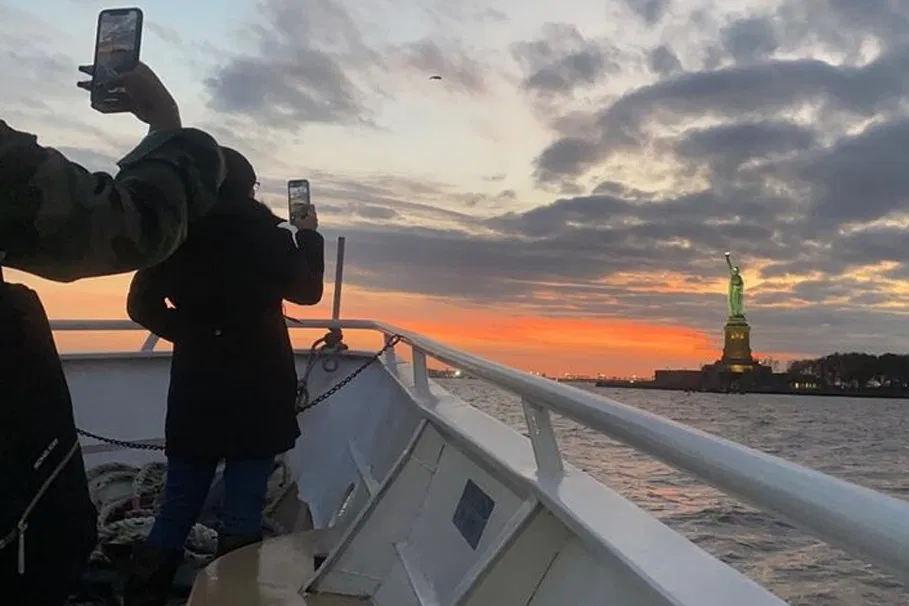 Statue of Liberty and Ellis Island sunset cruise | Tours & Travel Packages | Alikeimage